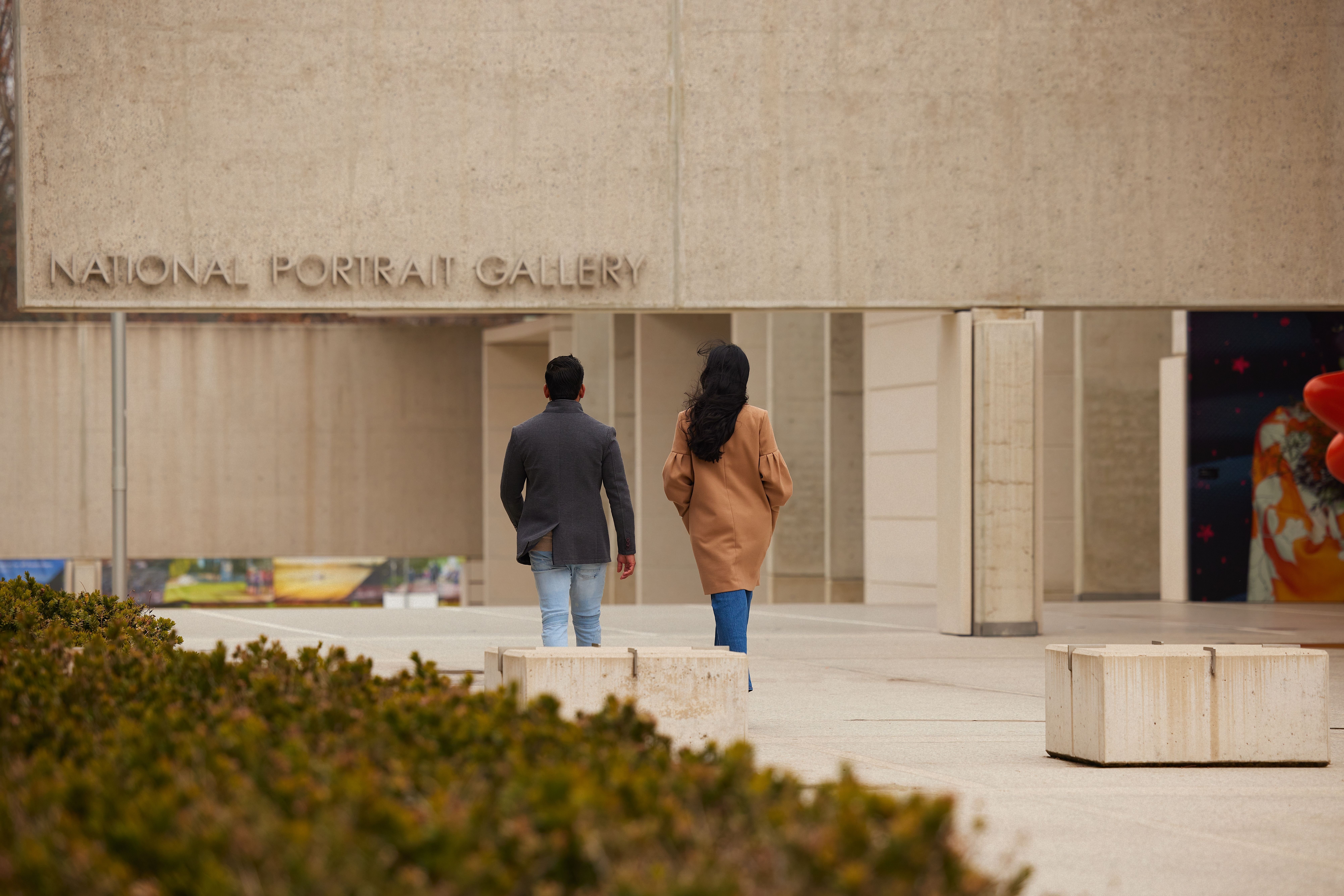 Two guests walk towards The National Portrait Gallery.