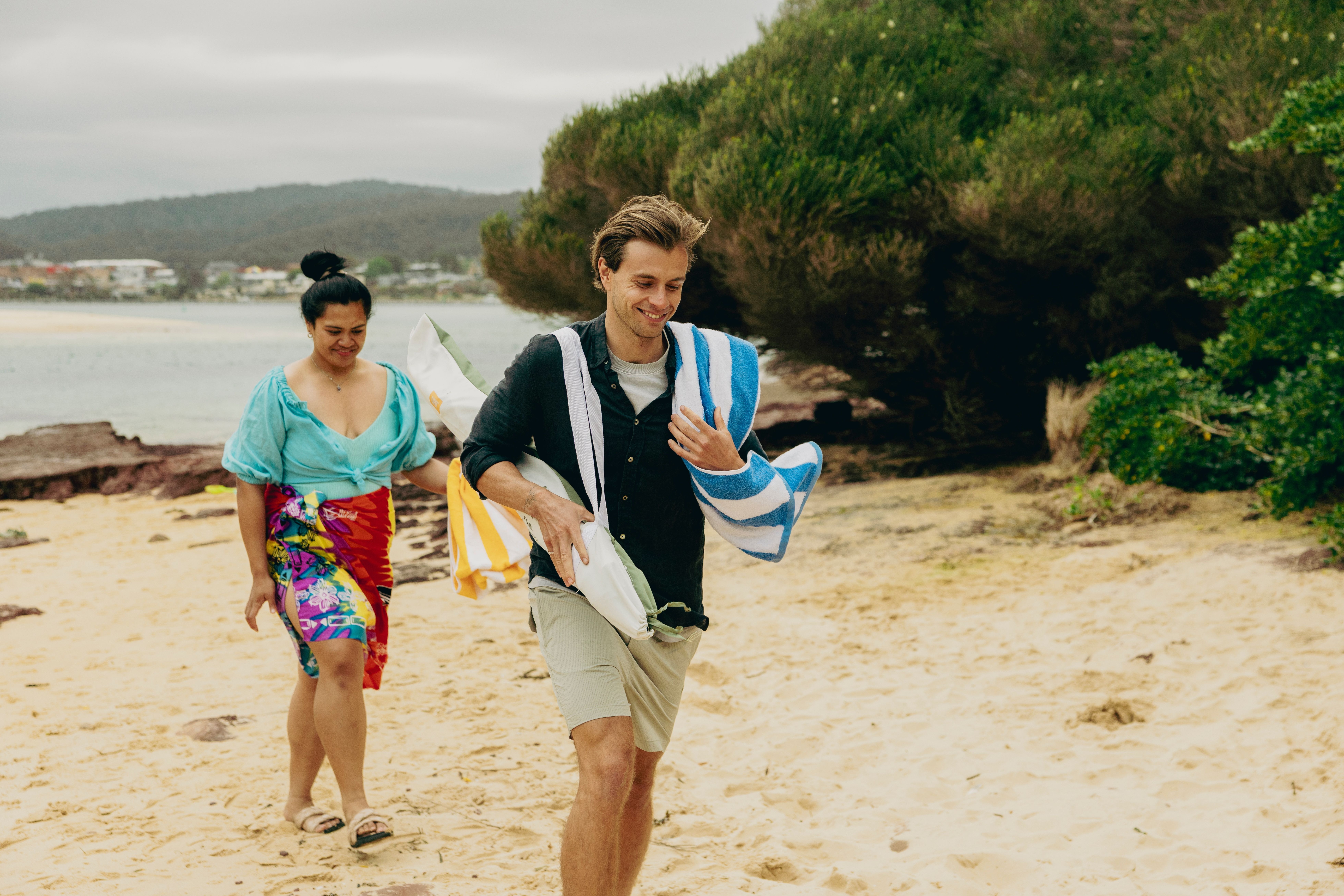 Couple enjoying a day at Bar Beach in Merimbula