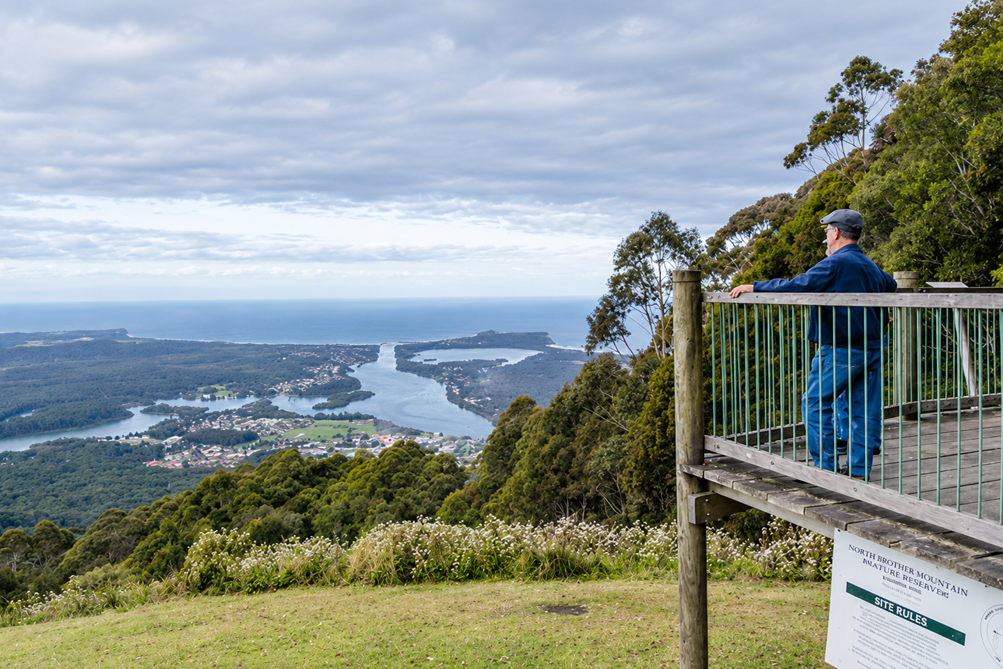 Visitors overlooking the Camden Haven River and coastline from Dooragan National Park.