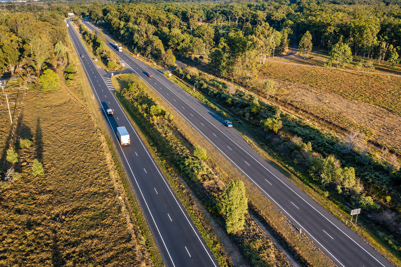 Aerial view of vehicles travelling along the Warrego Highway.